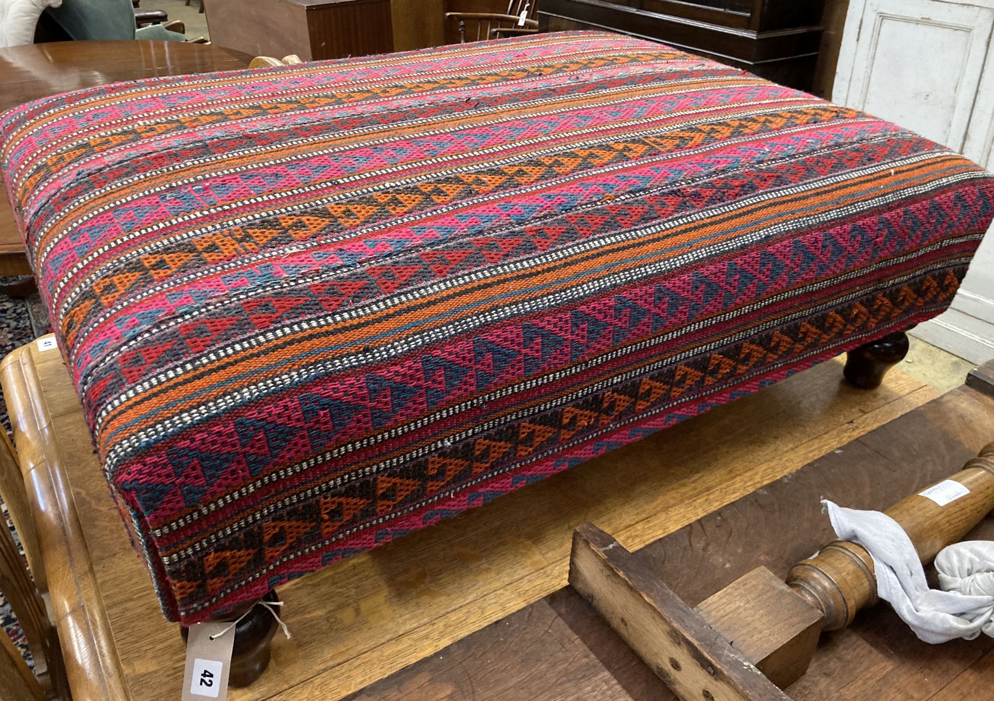 A Victorian style rectangular Kelim covered stool, width 98cm, depth 74cm, height 32cm